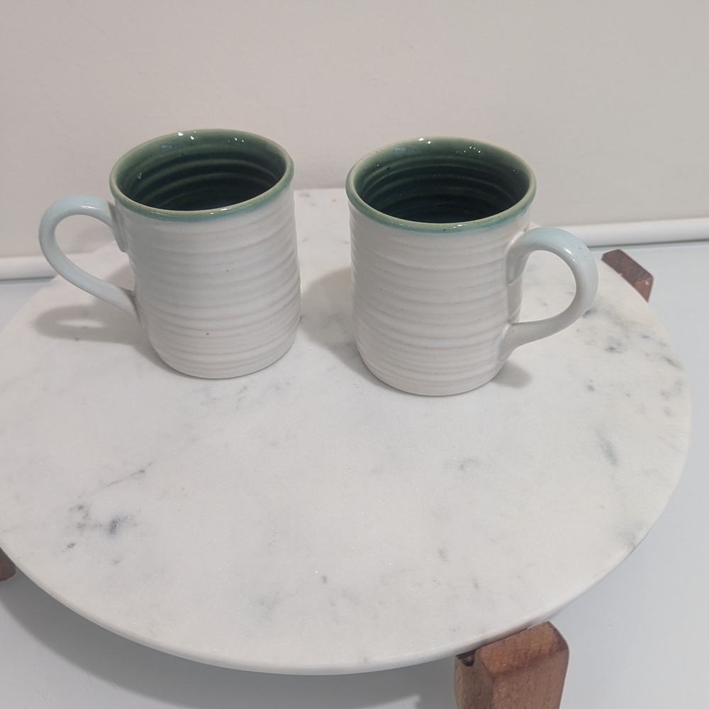 Elegant White and Green Ceramic Mugs